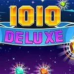 Gök mavisi arka planda 1010 DELUXE yazısı ve parlayan mücevherler