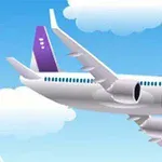 Mavi gökyüzünde uçan beyaz bir yolcu uçağı