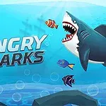 Bir köpekbalığı ve diğer küçük balıklarla denizaltı sahnesinde Angry Sharks yazısı