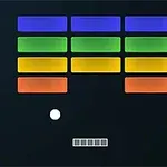 Renkli bloklar, küçük bir beyaz top, hareketli bir platform ve sağ alt köşede Atari logosu bulunan retro bir oyun ekranı