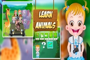 Bir kız çocuğu ve safari aracındaki hayvanlar ile Learn Animals (Hayvanları Öğren) yazılı tabela