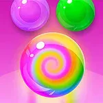 Pembe arka plan üzerinde, ortada büyük renkli bir spiral desenli top ve üstte iki yuvarlak yeşil ve mor top