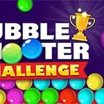 Renkli baloncuklar ve kupa simgesiyle süslenmiş Bubble Shooter Challenge metni
