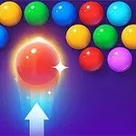 Renkli topların sıralandığı ve merkezde parlayan bir topun yukarı yönlendiği bir sahne