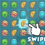 Renkli şeker ve çörek simgeleri bulunan bir ızgarada, bir el işareti ve Swipe yazısı