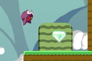 Mor yaratık zıplayarak yeşil bir platform üzerinde duran parlayan bir elmasa doğru gidiyor