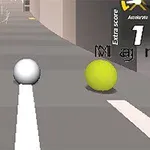 Gri bir yol üzerinde hareket eden beyaz ve sarı renkli iki top