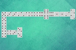 Yeşil arka plan üzerinde sırayla dizilmiş beyaz domino taşları