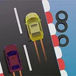 Yarış pistinde, kırmızı ve sarı iki araba yan yana yarışıyor; yol kenarında lastikler sıralı