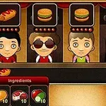 Dört çizgi film karakteri hamburger ve sosisli sipariş ederken, ekranın alt kısmında malzemelerle dolu bir arayüz görünmektedir
