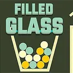 Yeşil ve sarı toplarla dolu bir bardağın üzerinde Filled Glass yazısı