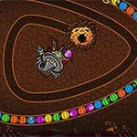 Karışık renkli toplar spirali ve ortasında bir kurukafa figürü