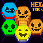 Hexa Sort Trick or Treat Renkli altıgenler üzerinde korkutucu yüz ifadeleri olan semboller ve bir zombi eli