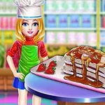 Mavi gözlü, sarı saçlı bir kız, üzerinde çilekler ve sos bulunan bir pasta ile birlikte mutfakta poz veriyor