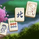 Pembe çiçekli bir ağaç ve yeşil bir arka plan önünde dört mahjong taşı