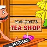 Sarık giysili bir adam, Mathais Tea Shop tabelasının önünde duruyor ve sağ tarafta sarı çiçekler bulunuyor