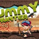 Üstünde Mummy Hunter metni olan, çizgi karakterin elinde silahla durduğu ve antik kalıntıların bulunduğu bir sahne