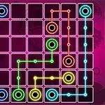 Neon renkli dairelerin ve yolların bulunduğu kareli bir bulmaca tahtası