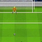 Yeşil sahada kırmızı formalı futbolcu kaleye penaltı atışı yapmaya hazırlanıyor, kaleci ise turuncu formasıyla kalede bekliyor
