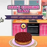 Bir mutfak tezgahında kirazlı bir kek ve yanında başparmak kaldırmış bir kadın karakter