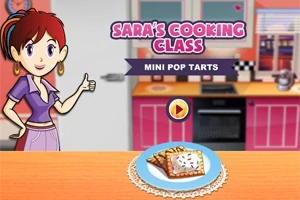 Kadın karakter mutfakta duruyor, önündeki masada bir tabak üzerinde mini pop tarts bulunuyor