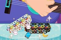 Renkli Super Loom oyununda harika bir Starburst bilezik yap!