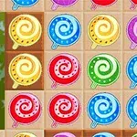 Renkli spiral şekilli lolipoplardan oluşan bir ızgara deseni