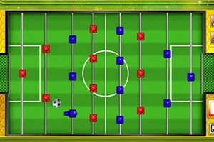 Yeşil bir sahada kırmızı ve mavi bloklar ile bir futbol topunun bulunduğu masa futbolu benzeri bir düzen