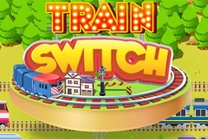 Yuvarlak bir platform üzerinde tren, küçük bir istasyon binası ve tabelalar ile çevresinde TRAIN SWITCH yazan renkli grafikler