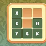 Yeşil ve kahverengi tonlarında zemine yerleştirilmiş kare şekilli bir kutu, içinde X, E, H, Y, S, K harflerinin yer aldığı bir düzen
