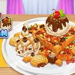 Dondurma, çikolata sosu, şekerlemeler ve meyve dilimleriyle süslenmiş waffle tabağı